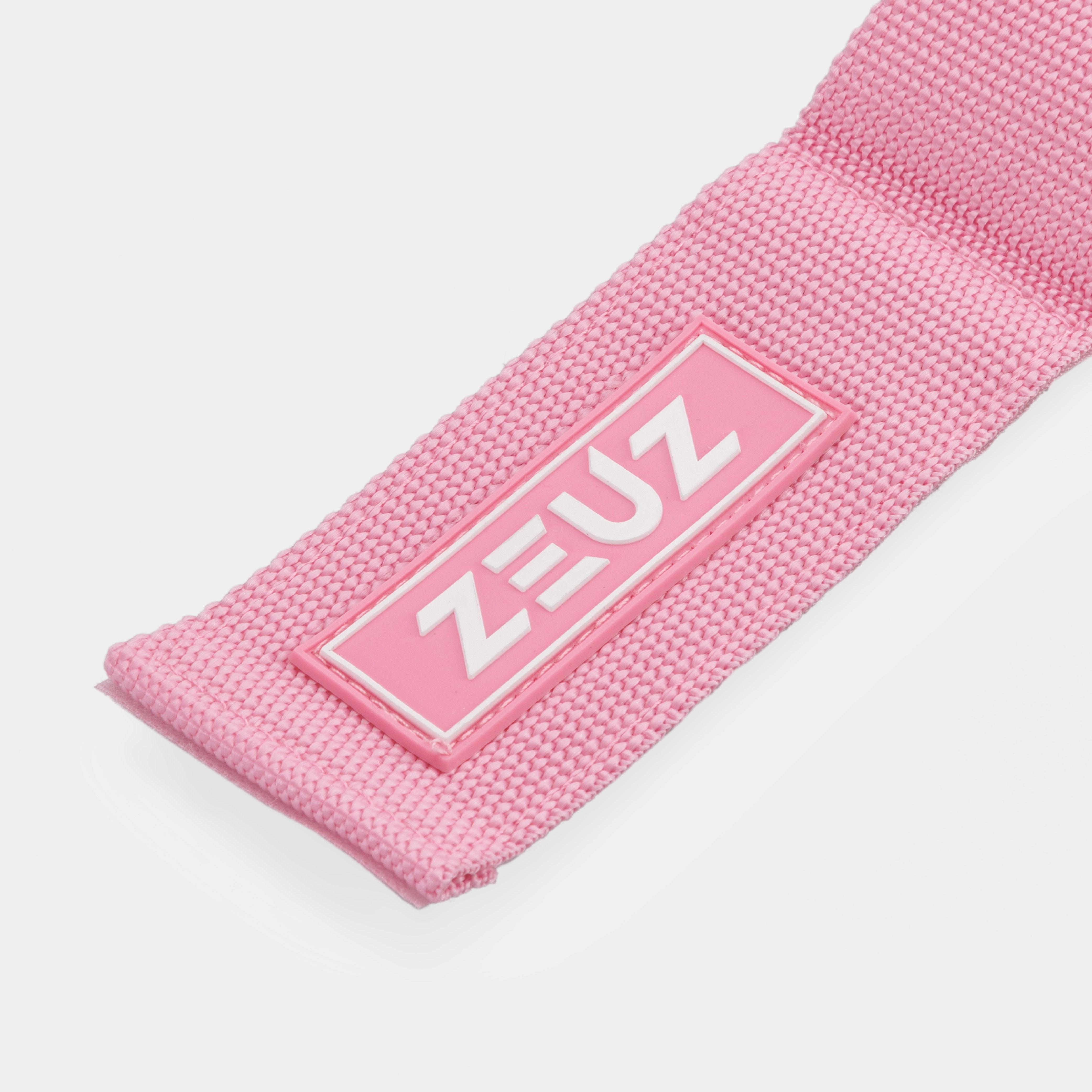 Detail van het ZEUZ-logo op de Ankle Straps roze – rubber label