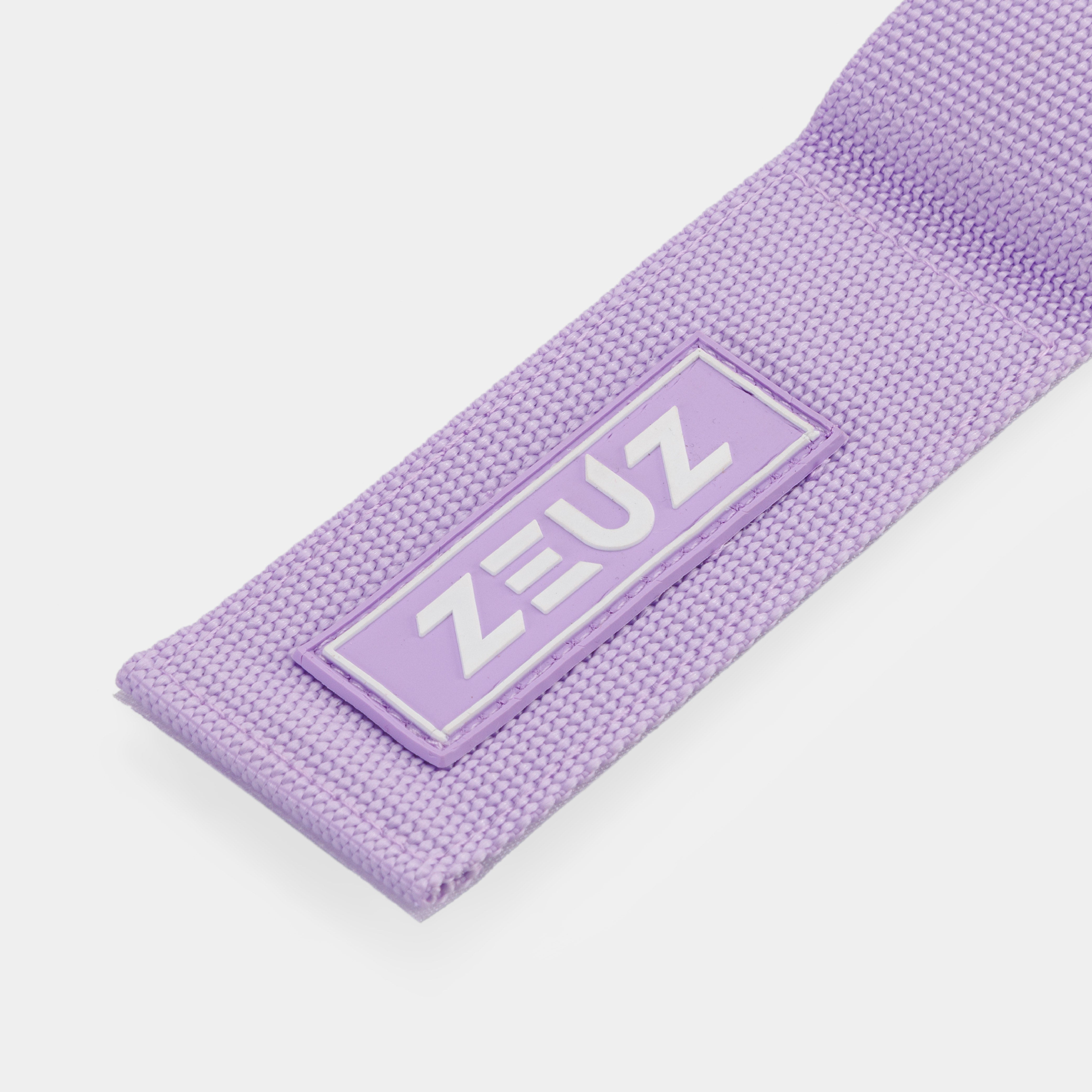 Detail van het ZEUZ-logo op de Ankle Straps lila – rubber label