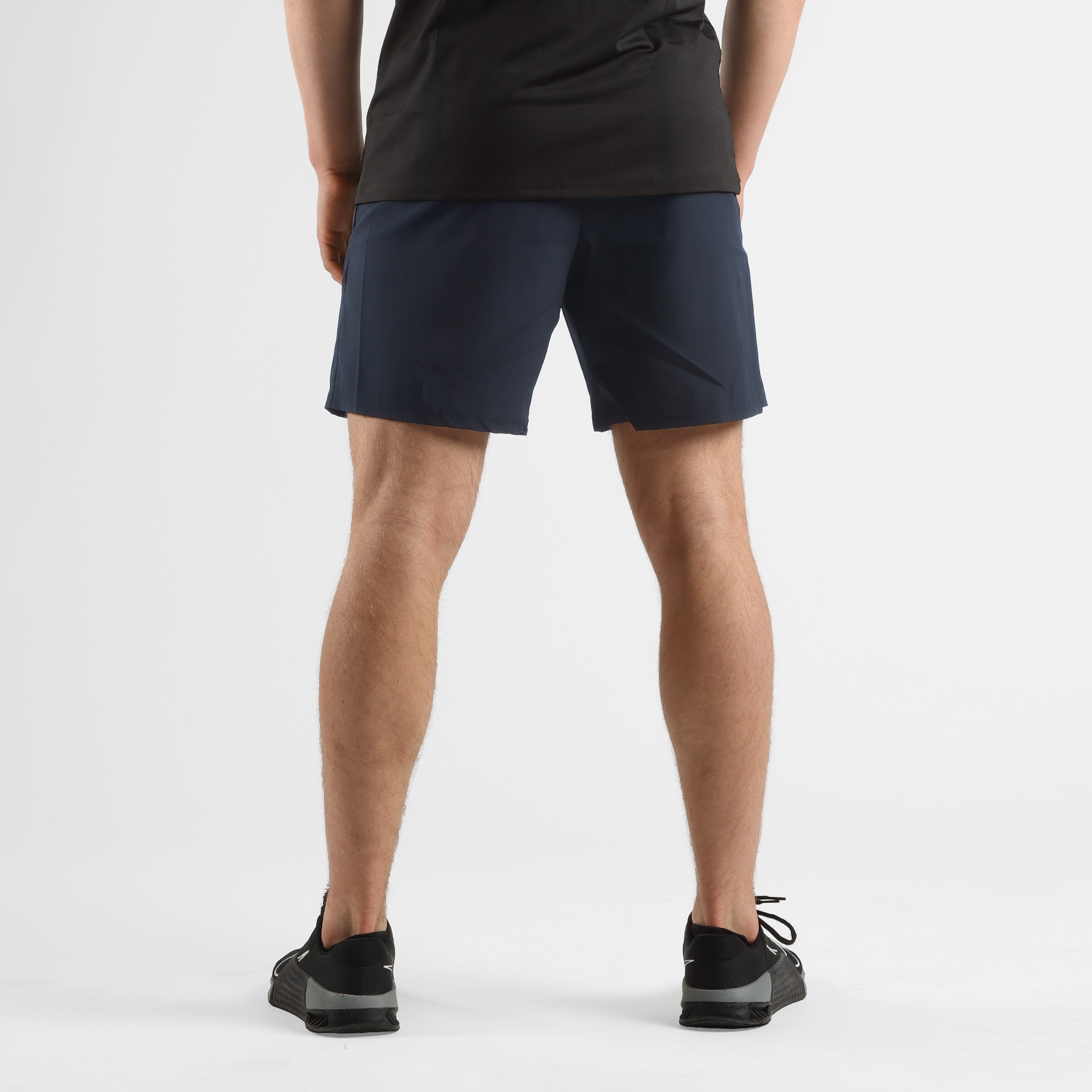 Achterkant van ZEUZ Sport Shorts marineblauw – sportief en functioneel model