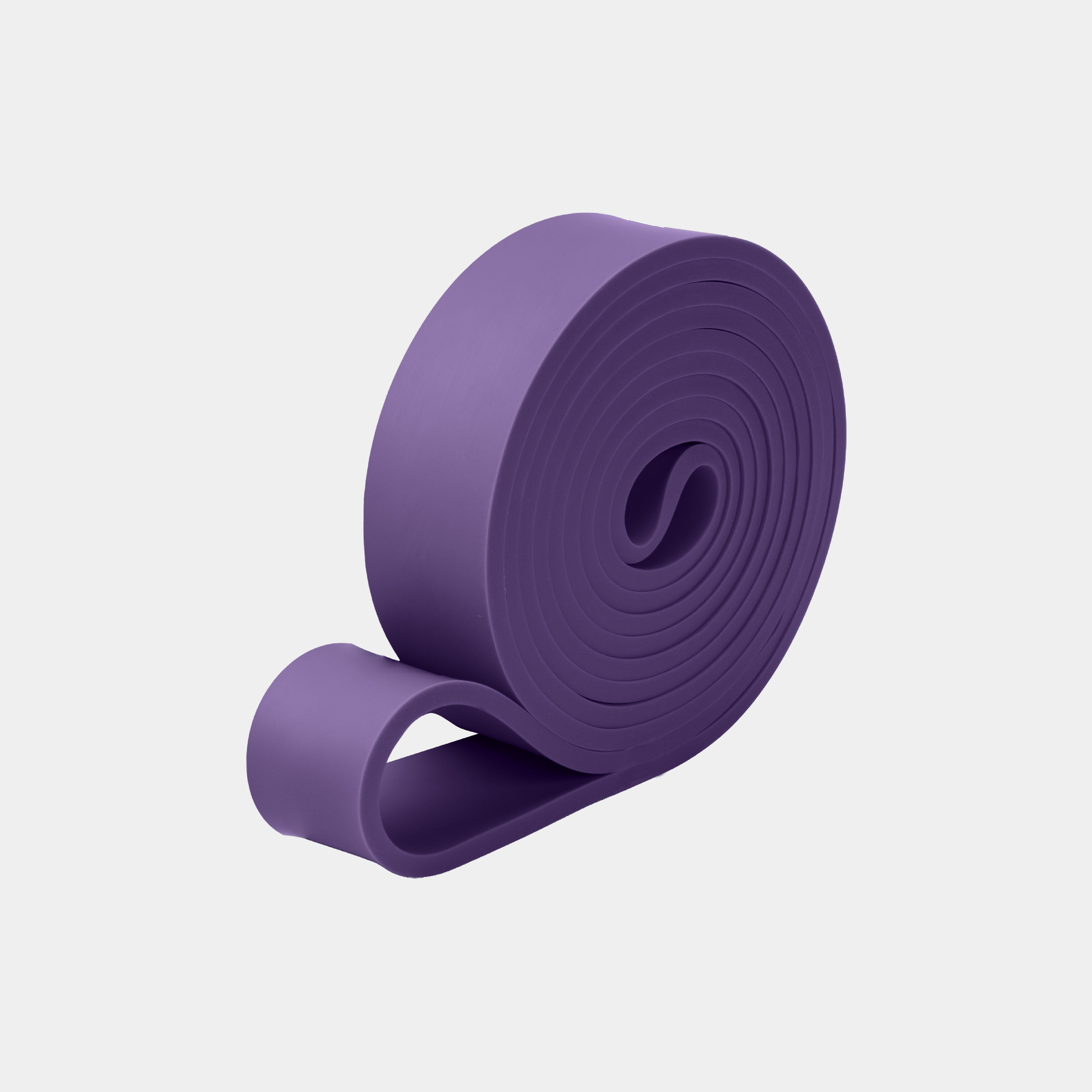 ZEUZ Powerband paars opgerold – compacte en duurzame weerstandsband (16 tot 38 kg)