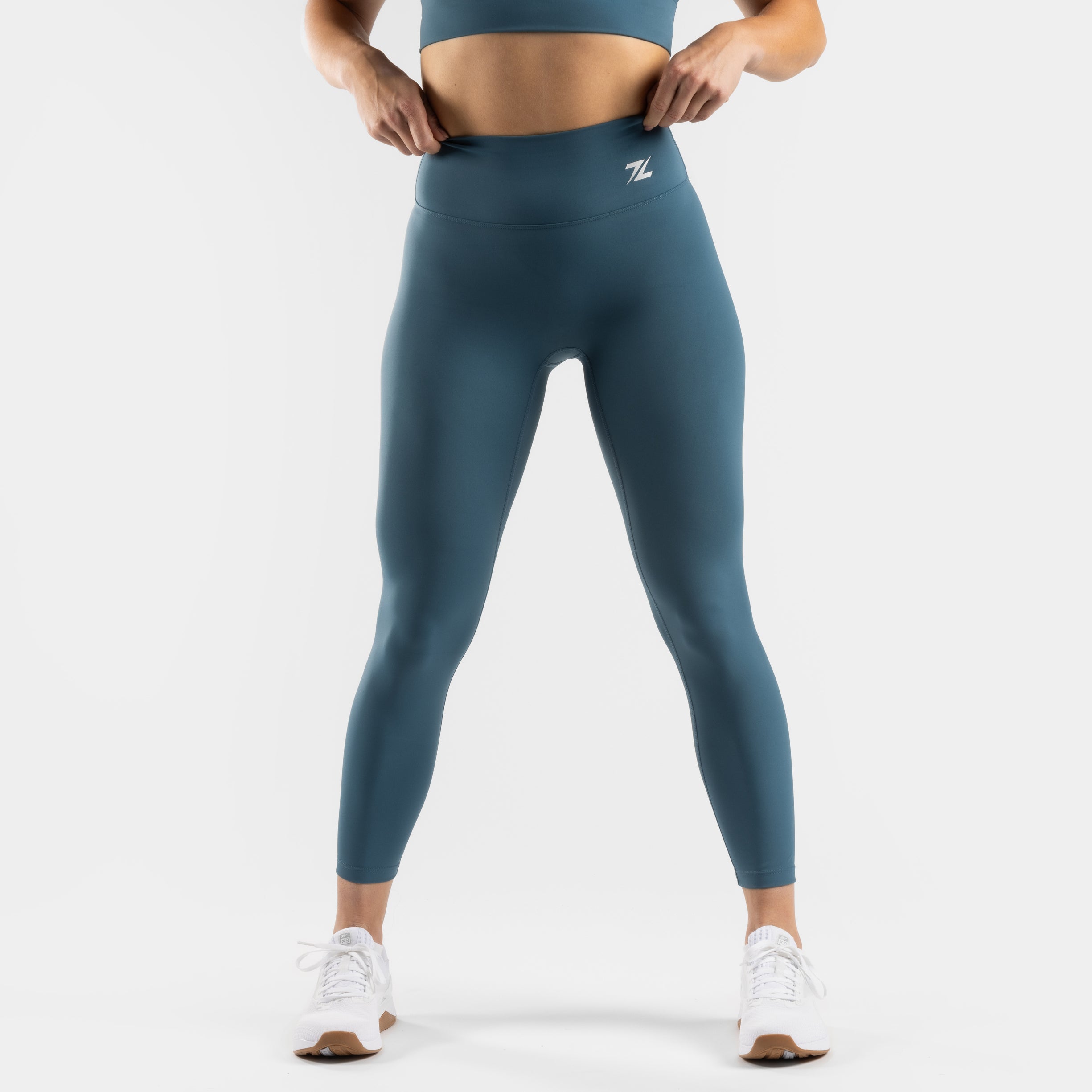 ZEUZ Sportlegging lang blauw – voorkant met hoge tailleband en strakke pasvorm